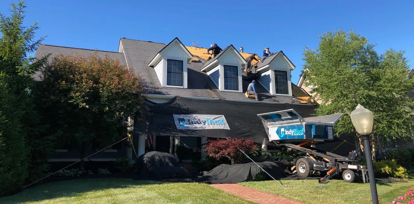 Tarping and dry-in on a Bridgewater Club commercial roof